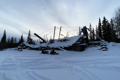 Klondike Snowmobile Association members checking out the sternwheeler graveyard on the banks of the Yukon River near Dawson City, Yukon - March 2025