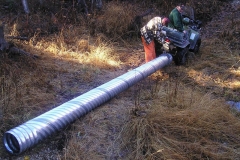 K.S.A. Volunteers installing a culvert on a local trail - Summer 2004