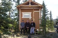 K.S.A. Volunteers putting the finishing touches on the warmup cabin on the Dawson Overland Trail - September 2005